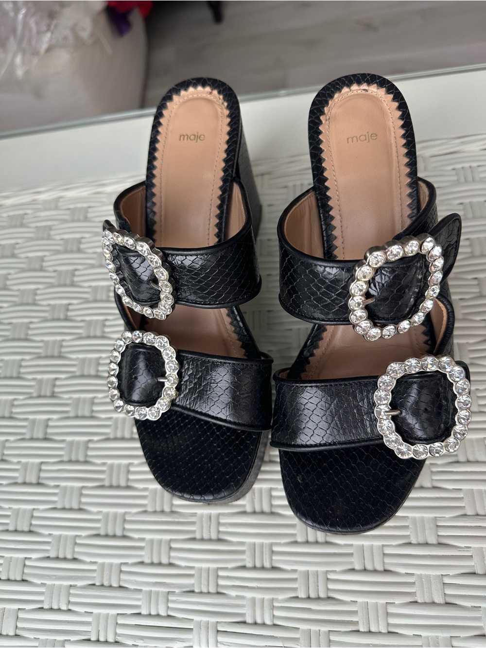 Maje crystal buckle platform heeled mules in black textured leather